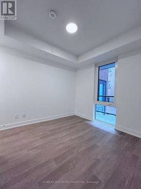Toronto (Church-Yonge Corridor) condo for rent - A room with a window and wooden flooring.