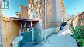 Mississauga (East Credit) townhouse for rent - A real estate company's photo of a house with a balcony.