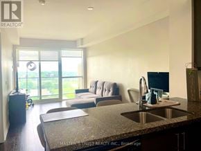 Toronto (Downsview-Roding-Cfb) condo for rent - A kitchen area with a sink, a chair, and a window.