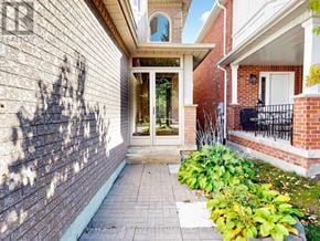 Newmarket (Summerhill Estates) apartment for rent - A brick wall with a shadow of a tree on it.