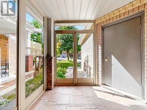 Newmarket (Summerhill Estates) apartment for rent - A view from the inside of a house looking out through a glass door.