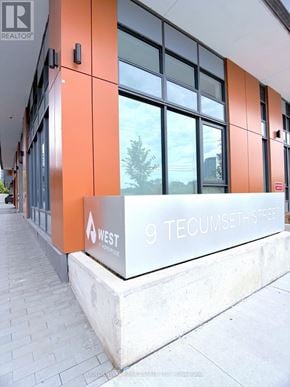 Toronto (Niagara) condo for rent - A building with a sign that says West on it.