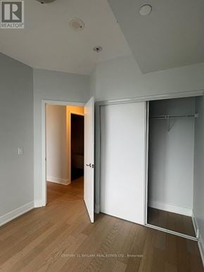 Toronto (Mimico) condo for rent - A room with a door open to a hallway.