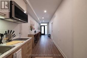 Toronto (Kensington-Chinatown) apartment for rent - A kitchen with a counter and a sink.