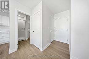 St. Catharines (Downtown) multi-family for rent - A white interior of a room with a door and a drawer.