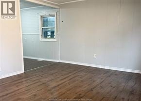 Windsor apartment for rent - A room with wooden flooring and a window.