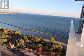 Toronto (High Park-Swansea) condo for rent - A view of a residential area with a body of water in the background.