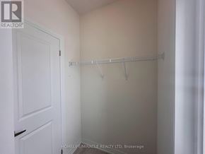 Brampton (Bram East) duplex for rent - A white door is on the left and a white wall is on the right.