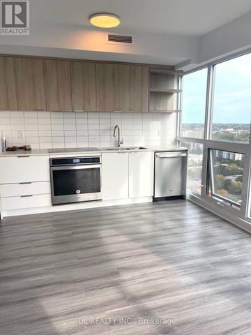 Toronto (Flemingdon Park) condo for rent - A modern kitchen with a view of the city.