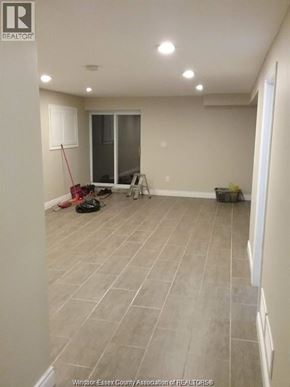 Windsor apartment for rent - A room with a tile floor and a window.