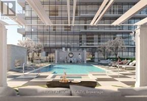 Toronto (Humber Heights) condo for rent - A modern building with a pool in front.