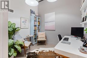 Toronto (Niagara) condo for rent - A room with a desk, chair, and bookshelf.