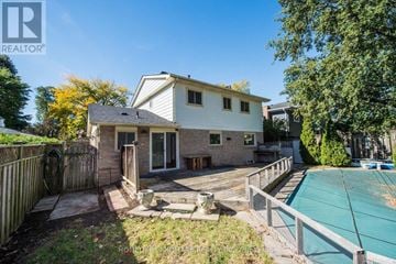 Oakville (Fd Ford) apartment for rent - A house with a pool in the backyard.