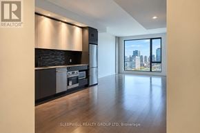 Ottawa condo for rent - A modern kitchen with a view of the city.