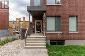Ottawa multi-family for rent - A brick building with the number 1267 on it.