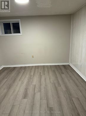 Vaughan (West Woodbridge) apartment for rent - A room with wood flooring and a window.