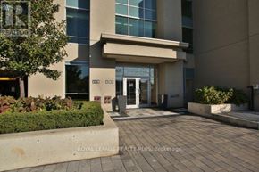 Toronto (Mimico) condo for rent - The entrance to a building with a sign that reads "Royal LePage Realty Plus Brokerage".