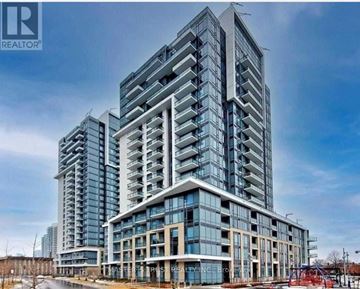 Toronto (Henry Farm) condo for rent - A modern multi-story building with a glass facade and a sign that reads "REALTOR".