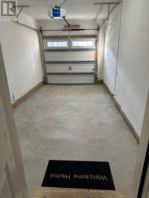 Brampton (Northwest Brampton) apartment for rent - A room with a sign on the floor that says "HOMELIFE MIRACLE REALTY LTD Brokerage".