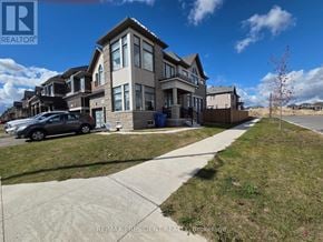 Erin apartment for rent - A house with a car parked in front of it.