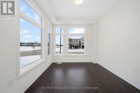 Erin apartment for rent - A room with a view of a snowy landscape outside the window.