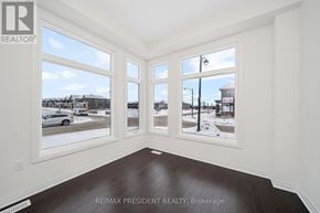 Erin apartment for rent - A room with a view of a snowy street outside the windows.