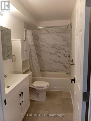 Ottawa apartment for rent - A kitchen area with a dining table and chairs in a room with EXP REALTY, Brokerage watermark.