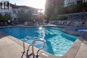 Coquitlam apartment for rent - A pool with a ladder and a sunny day.