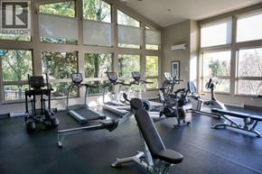 Coquitlam apartment for rent - A gym with treadmills, elliptical machines, and other exercise equipment.