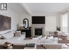 Langdale apartment for rent - A living room with a white couch and a fireplace.