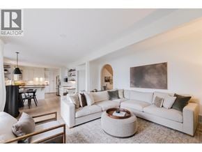Langdale apartment for rent - A modern living room with a large white sofa and a coffee table.