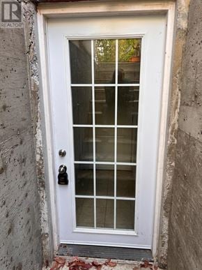 Brampton (Brampton South) apartment for rent - A white door with a glass panel and a black handle.