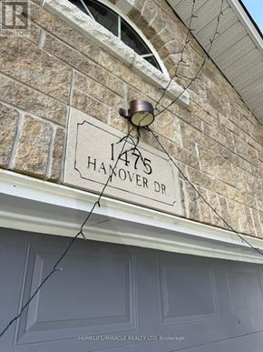 Kingston (City Northwest) apartment for rent - A sign on a building that says 1475 Haxover Dr.