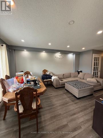 Kingston (City Northwest) apartment for rent - A living room with a dining table and chairs.