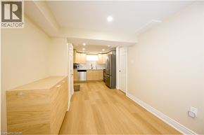 Burlington apartment for rent - A long hallway with a kitchen area at the end.