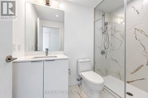 Toronto (Newtonbrook East) condo for rent - A white bathroom with a marble shower and a large mirror.