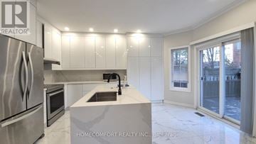 Richmond Hill (Langstaff) apartment for rent - A modern kitchen with a refrigerator and a sink.