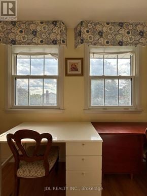 Toronto (Parkwoods-Donalda) apartment for rent - A room with a desk and chair in front of a window.