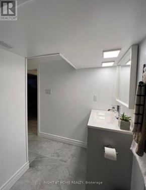 Brock (Beaverton) apartment for rent - A bathroom with a sink and mirror.