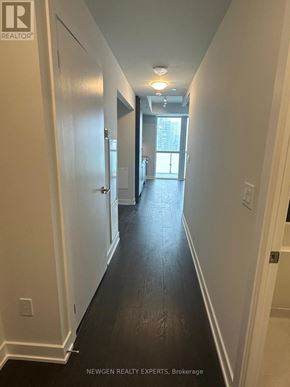 Mississauga (City Centre) condo for rent - A long hallway with doors on both sides.