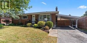 London East (East C) apartment for rent - A house with a white door and a brick exterior is for sale.