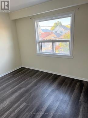 Toronto (Keelesdale-Eglinton West) apartment for rent - A room with a window showing a view of houses.