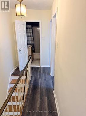 Toronto (Keelesdale-Eglinton West) apartment for rent - A hallway with a wooden floor and white walls.