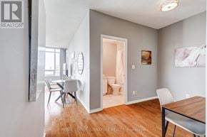 Toronto (Waterfront Communities) condo for rent - A dining room with a table and chairs is shown.