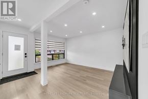 Toronto (Kennedy Park) apartment for rent - A spacious room with a door leading to a balcony.