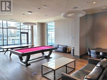 Vaughan (Vellore Village) condo for rent - A billiard table is in the middle of a living room.