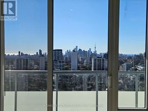 Toronto (Mount Pleasant West) condo for rent - A view of a city skyline from a high-rise building.