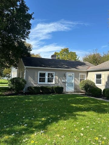Columbus apartment for rent - A house with a grey roof and a white door.