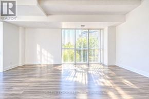 Toronto (Willowdale East) townhouse for rent - A sunny room with a sliding glass door.