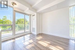 Toronto (Willowdale East) townhouse for rent - A sunny room with a sliding glass door.